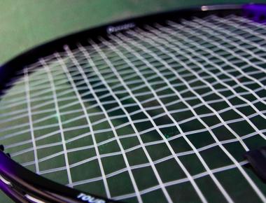 The string tension of most tennis racquets is around 50 to 70 pounds 220 to 310 newtons with lower tension a tennis racquet produces less control and more power while higher tension produces more control and less power