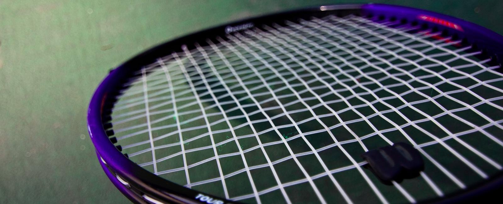 The string tension of most tennis racquets is around 50 to 70 pounds 220 to 310 newtons with lower tension a tennis racquet produces less control and more power while higher tension produces more control and less power