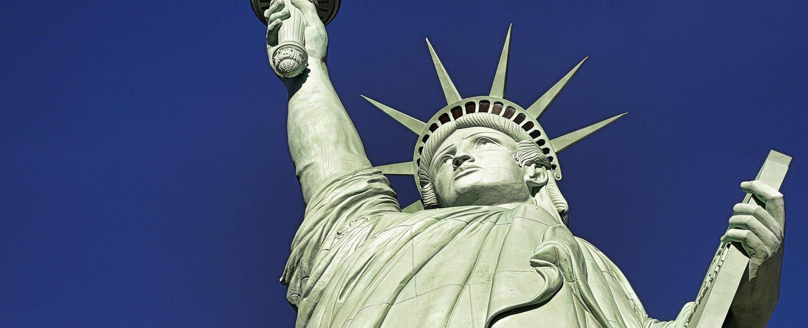 The name of the woman on the statue of liberty is mother of exiles