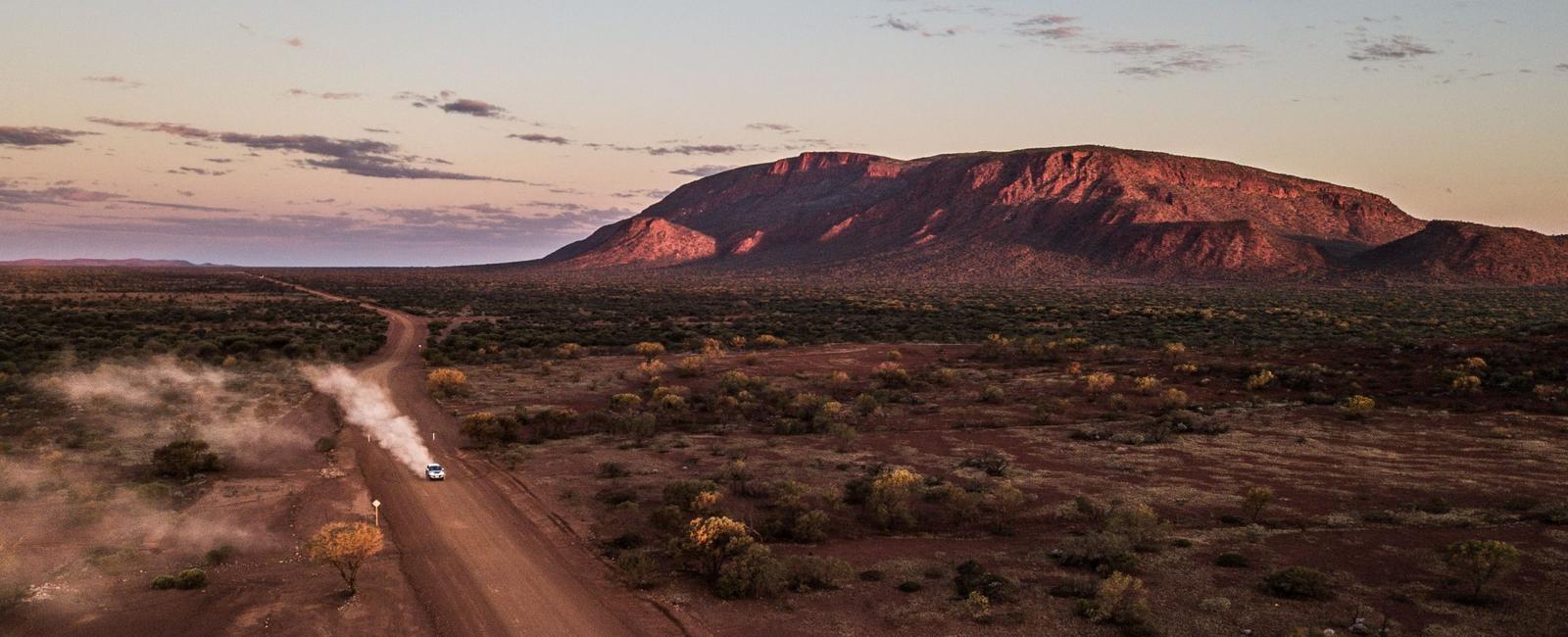 Mount augustus in australia is not a mountain but instead just a giant rock so giant at 2 300 feet tall 701m it can be seen from 100 miles 160 km away