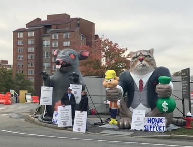 The giant inflatable rat that shows up at union protests has a name scabby