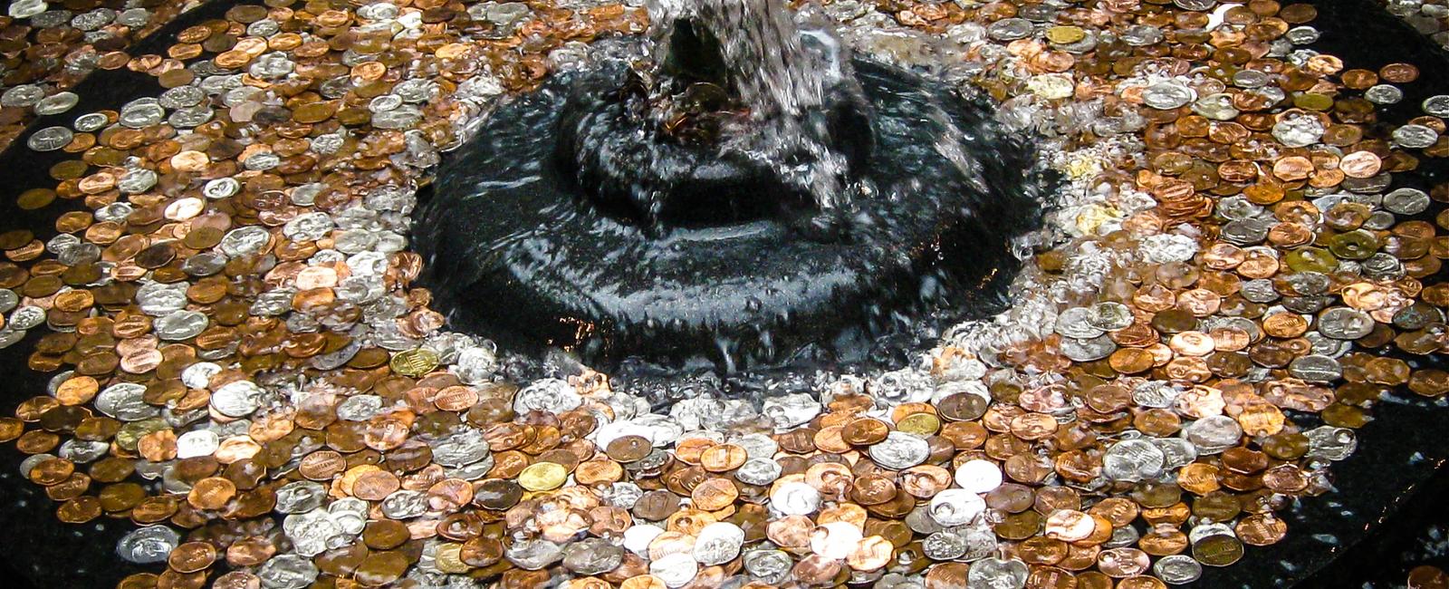 People toss coins into wishing wells and fountains as in ancient times water spirits and deities were thought to live in them