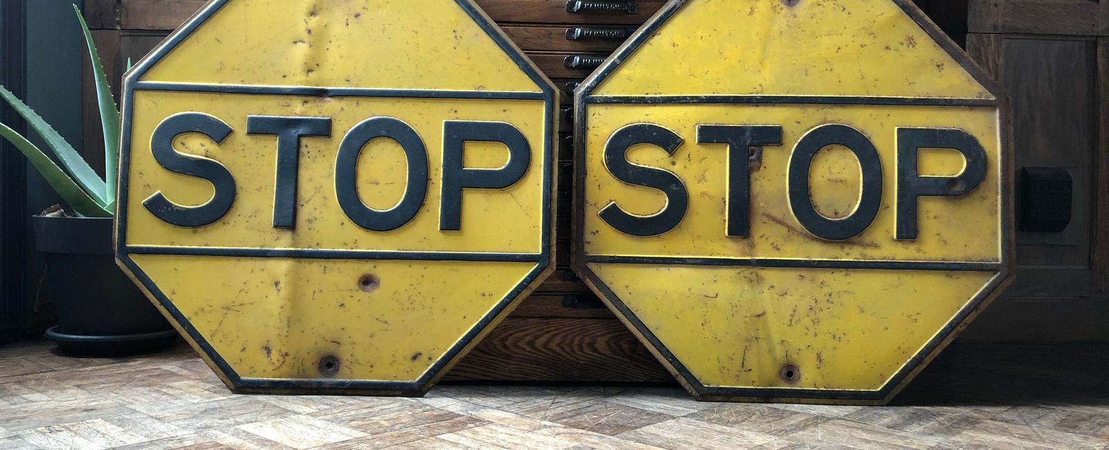 Stop signs used to be yellow at least in the u s this changed in the 1950s when sign makers started to have access to fade resistant porcelain enamel