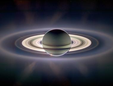 Saturn s rings made up of ice rock and dust are thought to be formed from pieces of asteroids comets and shattered moons