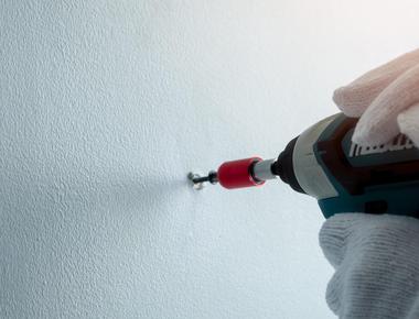 Put down masking tape before nailing into plaster walls