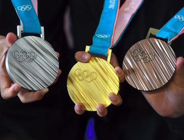 An olympic gold medal must contain 92 5 percent silver