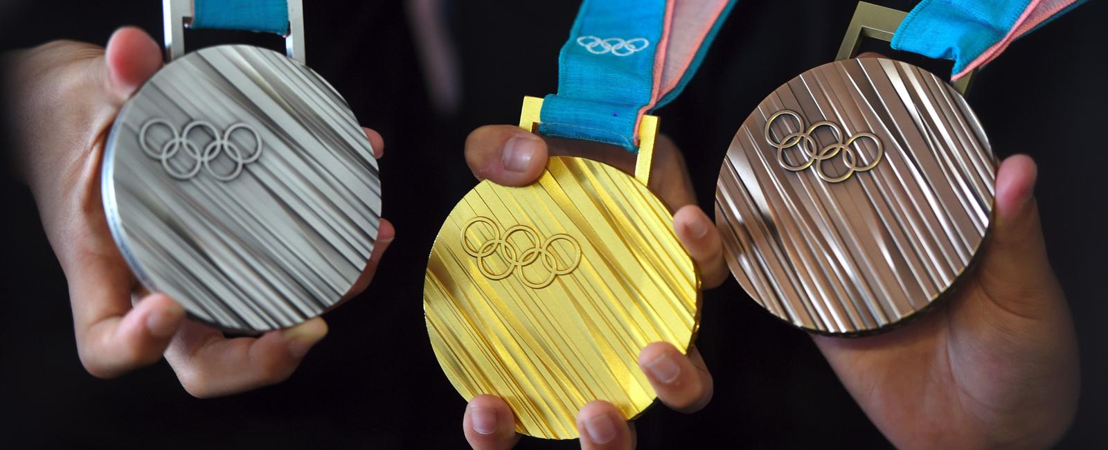 An olympic gold medal must contain 92 5 percent silver