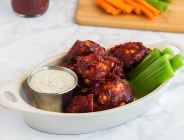 Cauliflower dipped in barbecue sauce tastes almost the same as chicken nuggets and it s infinitely healthier