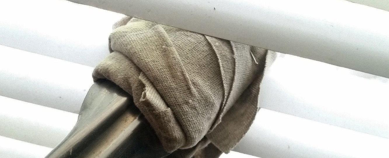 Use towel wrapped tongs to clean your blinds