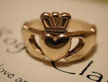 The claddagh is an irish love symbol usually found on rings that are often used as engagement rings the symbol has a crown symbolizing loyalty a heart symbolizing love and two hands symbolizing friendship