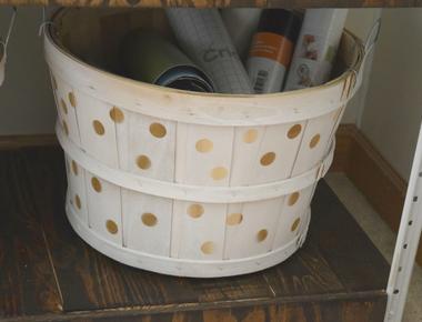 Use an old laundry basket as a polka dot stencil