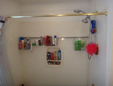 Use a second shower rod to store toiletries