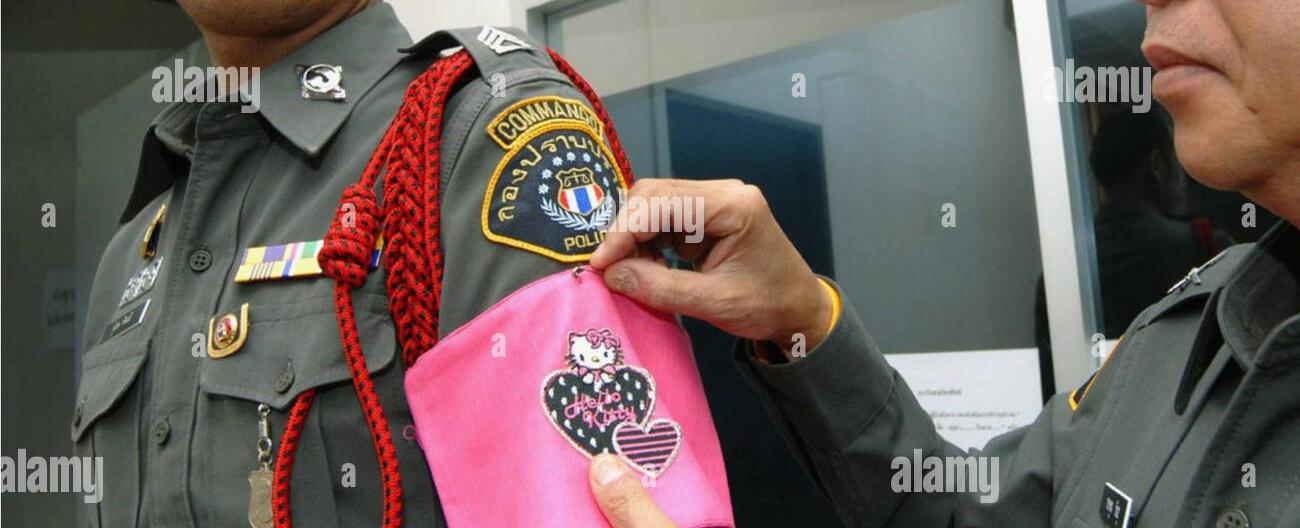 If thai policemen break the law they are forced to wear a hello kitty armband