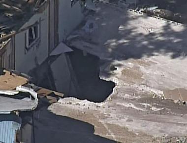 A florida man fell into a sinkhole that opened suddenly at night beneath the bedroom of his suburban tampa home calling out to his brother for help as he fell the body was never found even after diligent rescue operations