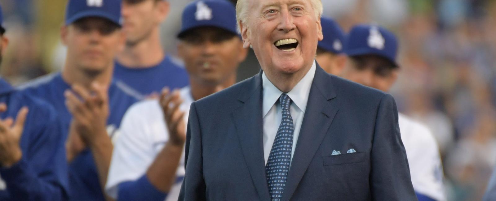 During vin scully s first year as a broadcaster in 1957 he was suspended by the dodgers for calling a home run with he hit that like it was marilyn monroe