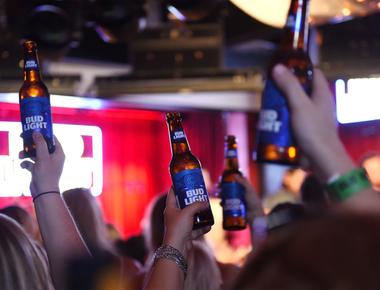 A wisconsin forklift operator for a miller beer distributor was fired when a picture was published in a newspaper showing him drinking a bud light