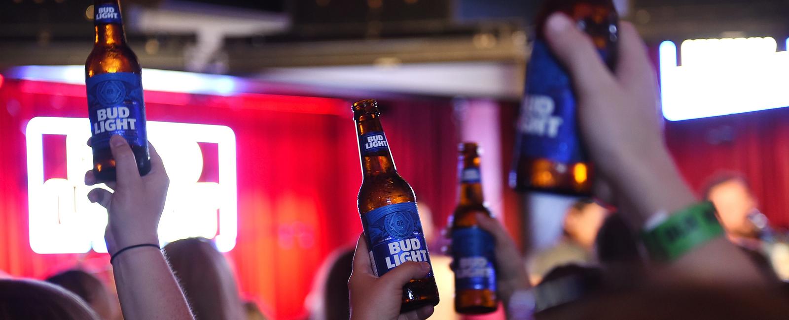 A wisconsin forklift operator for a miller beer distributor was fired when a picture was published in a newspaper showing him drinking a bud light