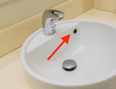 The little hole in the sink that lets the water drain out instead of flowing over the side is called a porcelator