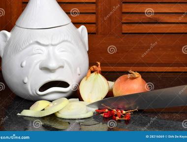 Cutting onions releases a gas which causes a stinging sensation when it comes into contact with your eyes your body produces tears to dilute the irritant and remove it from your eyes