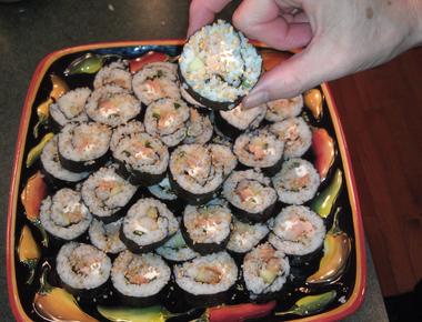 What is sushi traditionally wrapped in edible seaweed