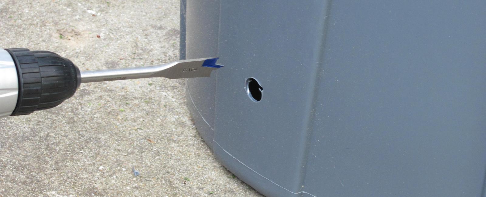 Drill a hole in the bottom of your trash can to keep bags from sticking