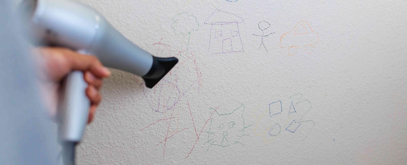 Use a hairdryer to get crayon marks off the walls