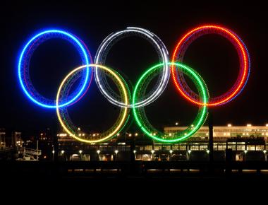 The olympic rings cover every flag in the world yellow green red black and blue were selected because at least one of those five colors appears in every flag in the world