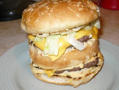 Two all beef patties special sauce lettuce and cheese in a sesame seed bun bigmac