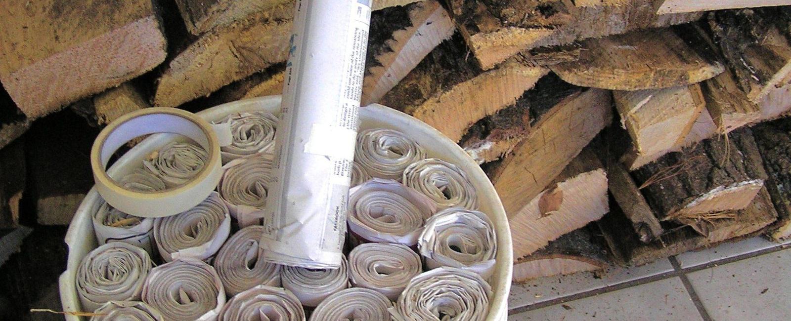 Make your own fireplace logs roll newspapers up tightly in shape of logs