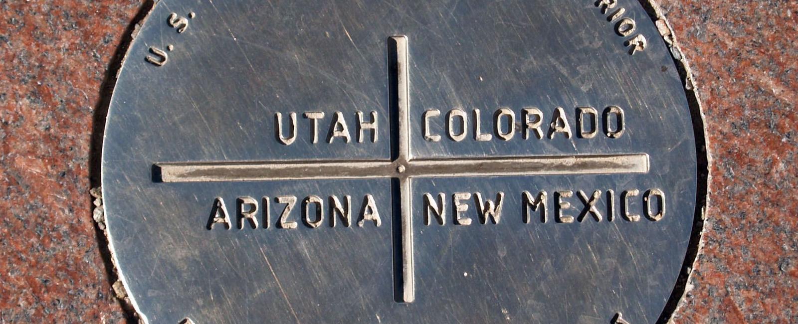 The four corners monument is the only spot in the us where you can stand in four states at once utah colorado arizona and new mexico