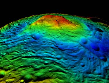 The highest mountain known to man is on an asteroid called vesta measuring a whopping 22km in height it is three times as tall as mount everest