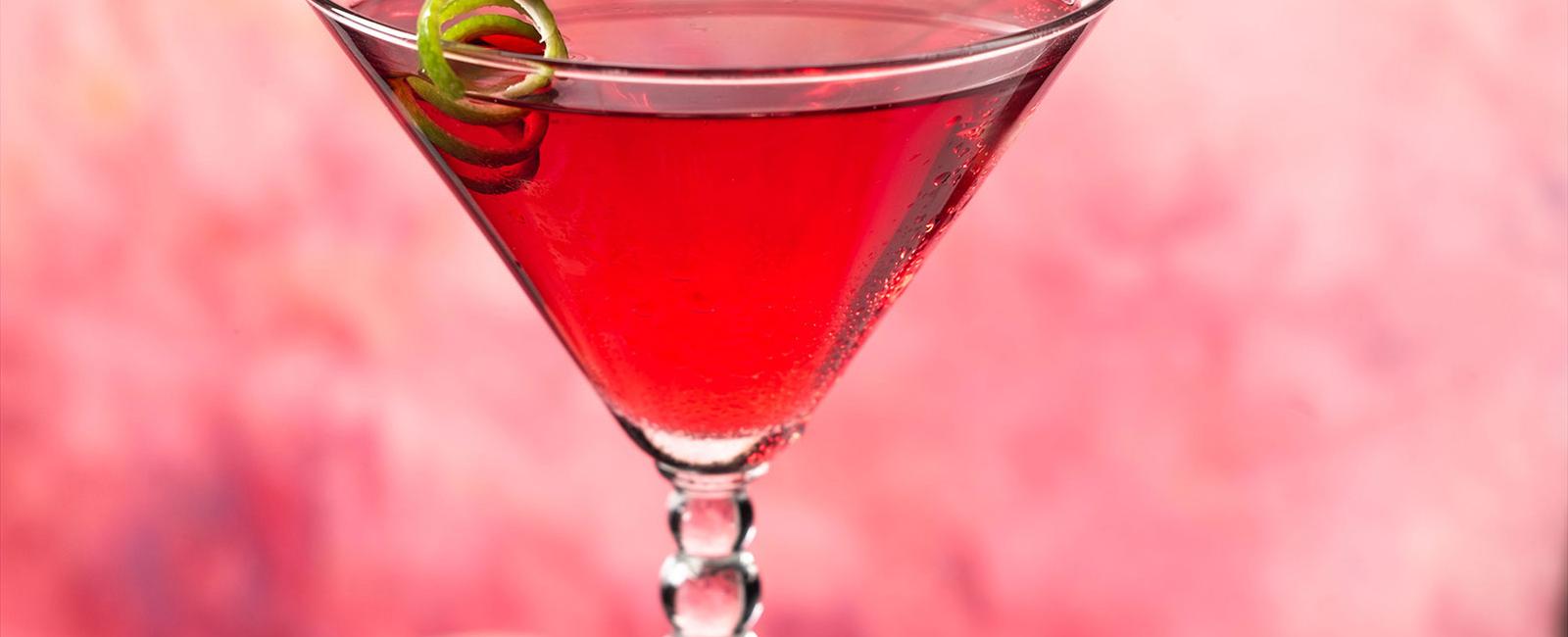 What are the two fruit juices in a cosmopolitan cranberry and lime