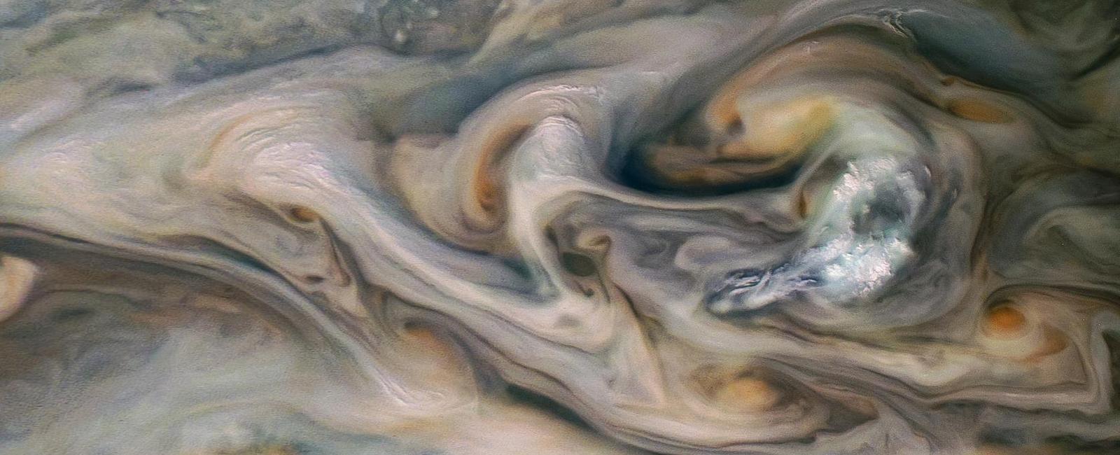 Jupiter s clouds change colors based on their altitude red clouds are the highest followed by brown and white clouds with blue clouds being the lowest