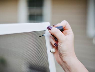 Fix a hole in a window screen with clear nail polish