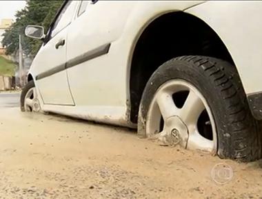 Construction workers in brazil cemented a car on a pavement after its driver refused to move it