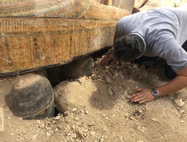 More than 100 painted wooden coffins many with bodies were found in the necropolis of saqqara officials said after several recent finds at the site it s the largest discovery there this year