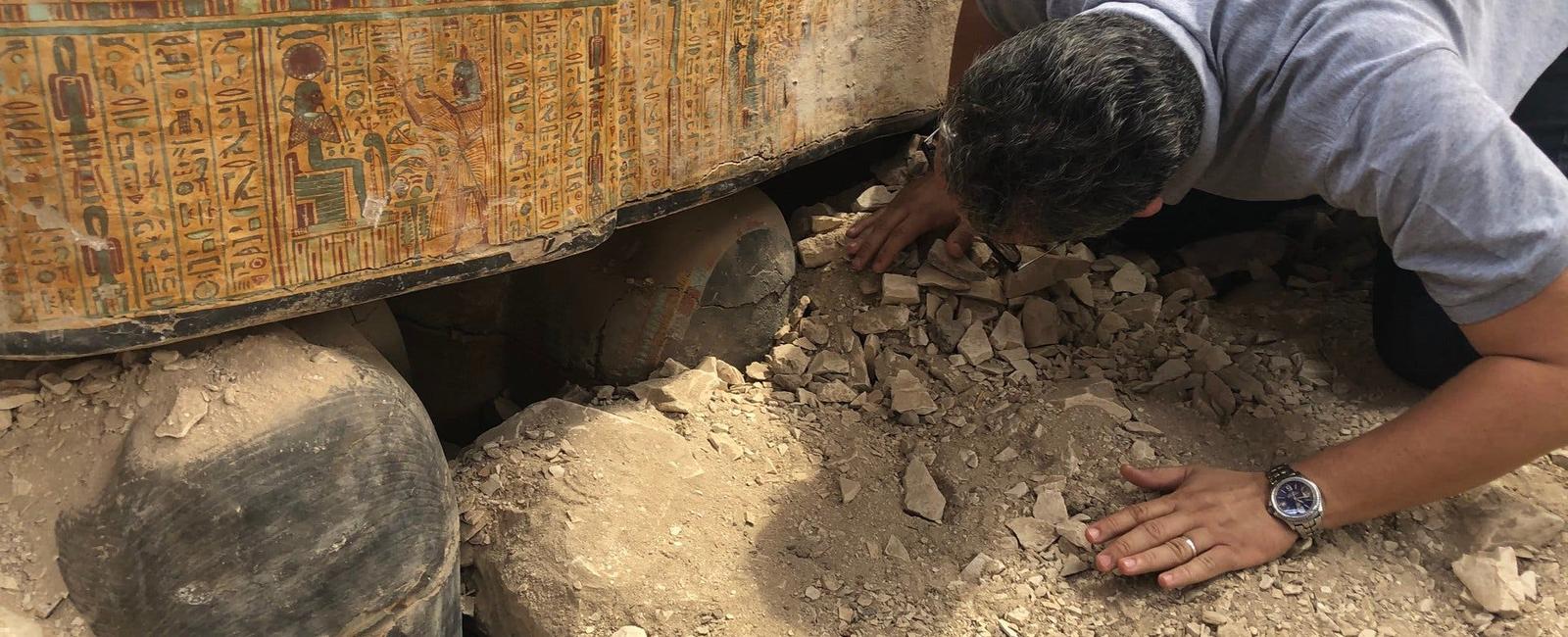 More than 100 painted wooden coffins many with bodies were found in the necropolis of saqqara officials said after several recent finds at the site it s the largest discovery there this year